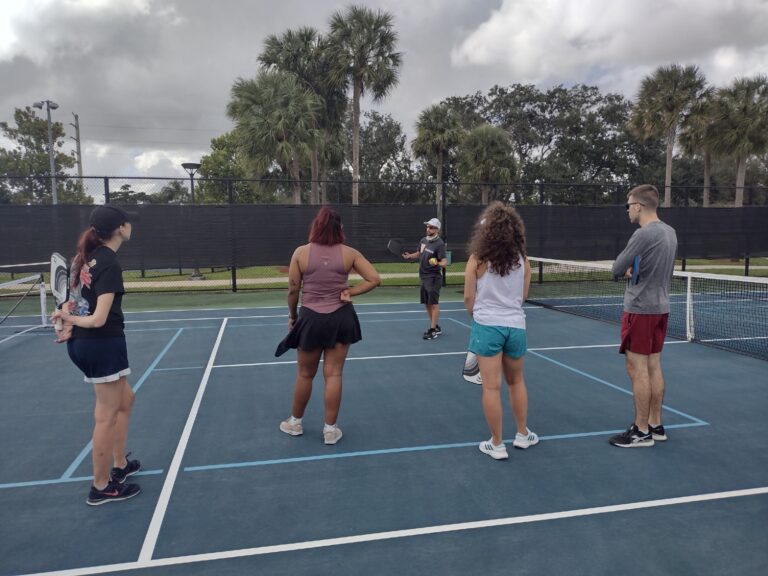 Douglas Liantonio teaching people pickleball